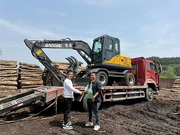 宝鼎90G轮式抓木机助力湖南老板装卸作业